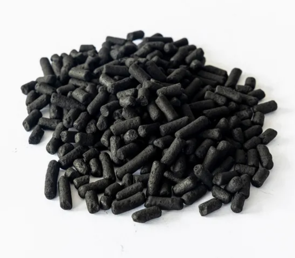 Cylindrical activated carbon pellets on a light background